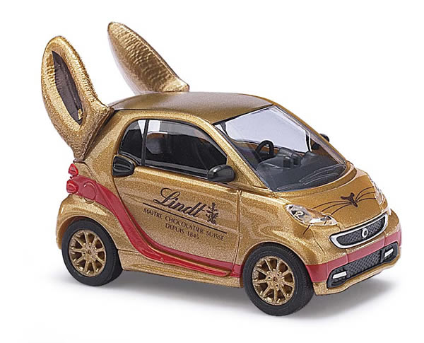 Busch 46211 - Smart Fortwo 2012 Lindt, Goldhase