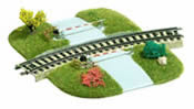 Railway level crossing for curved track