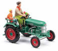 Tractor Kramer KL 11 with farmer and child