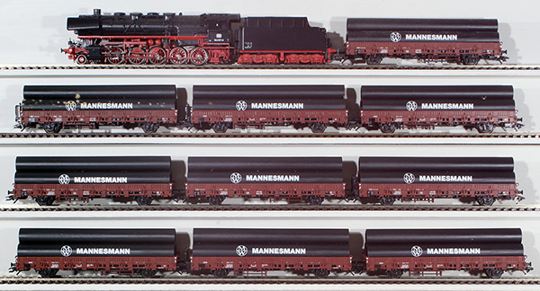 Consignment MA26558 - Marklin German Steam Locomotive BR44 with 10 Stake Cars Loaded with Steel Pipe of the DB