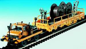 Kibri 16062 - H0 Two-way UNIMOG with push-pull frame and lowside car for catenary construction