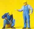 Workman standing/welding